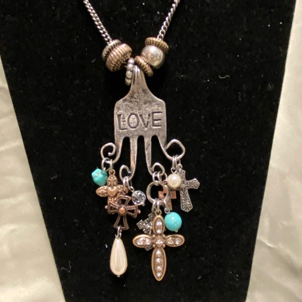 LOVE Fork Necklace with assortment of crosses dangling from tines